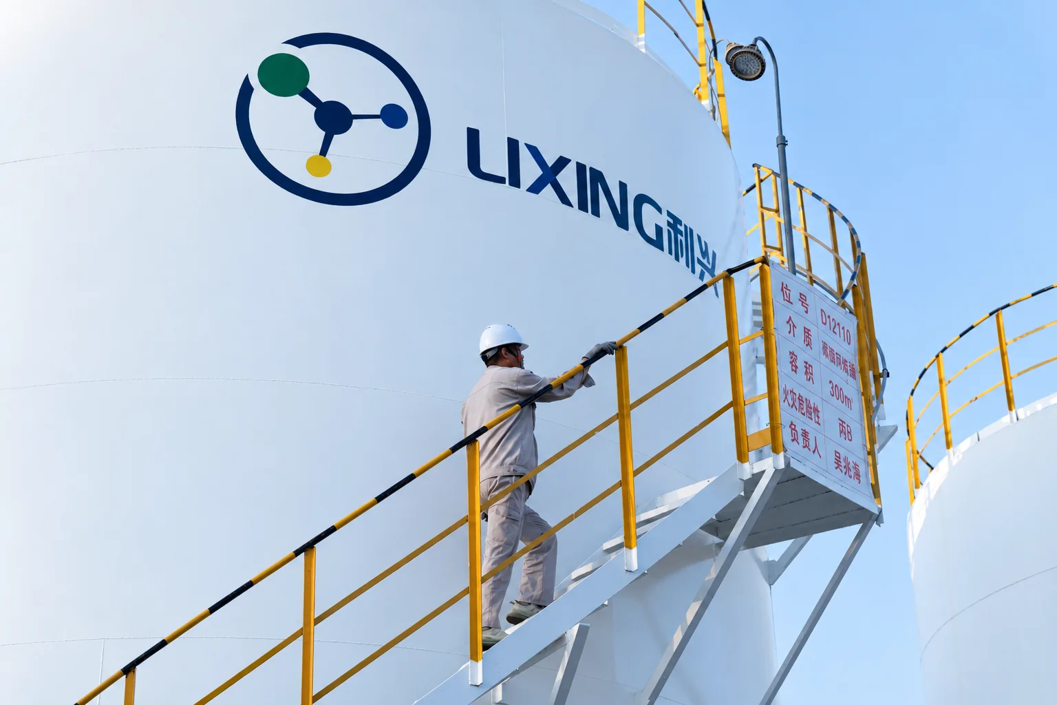 Operator working on an elevated storage tank